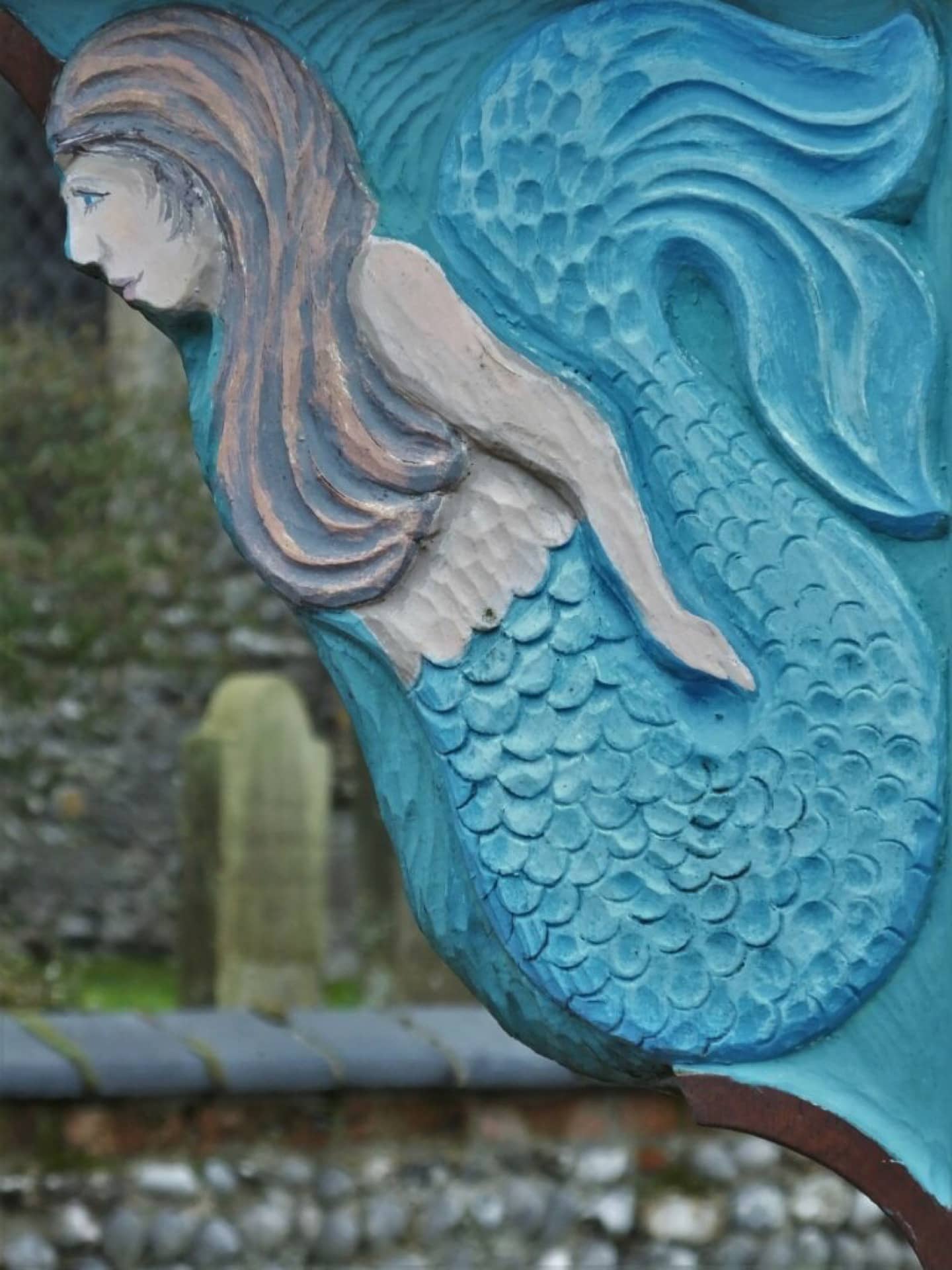 A mermaid carved and painted in Sheringham.
