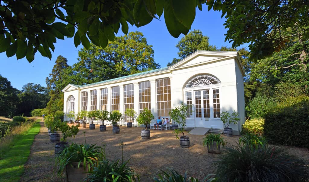 The outside of an Orangery with rectangular central windows at a stately home in Norfolk.