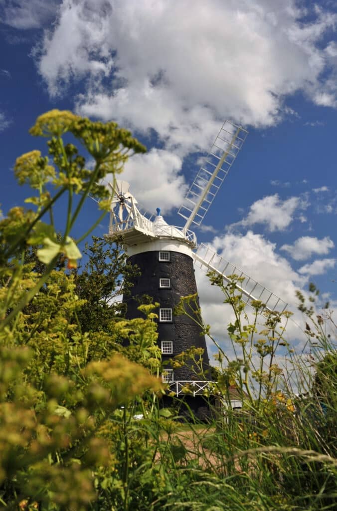 Windmill at Burnham Overy Staithe on the North Norfolk coast, Norfolk, UK.