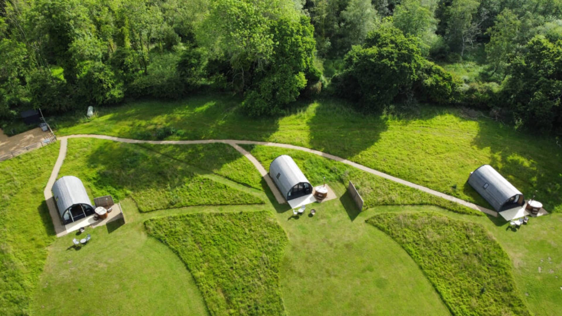 Aerial view of 3 glamping pods