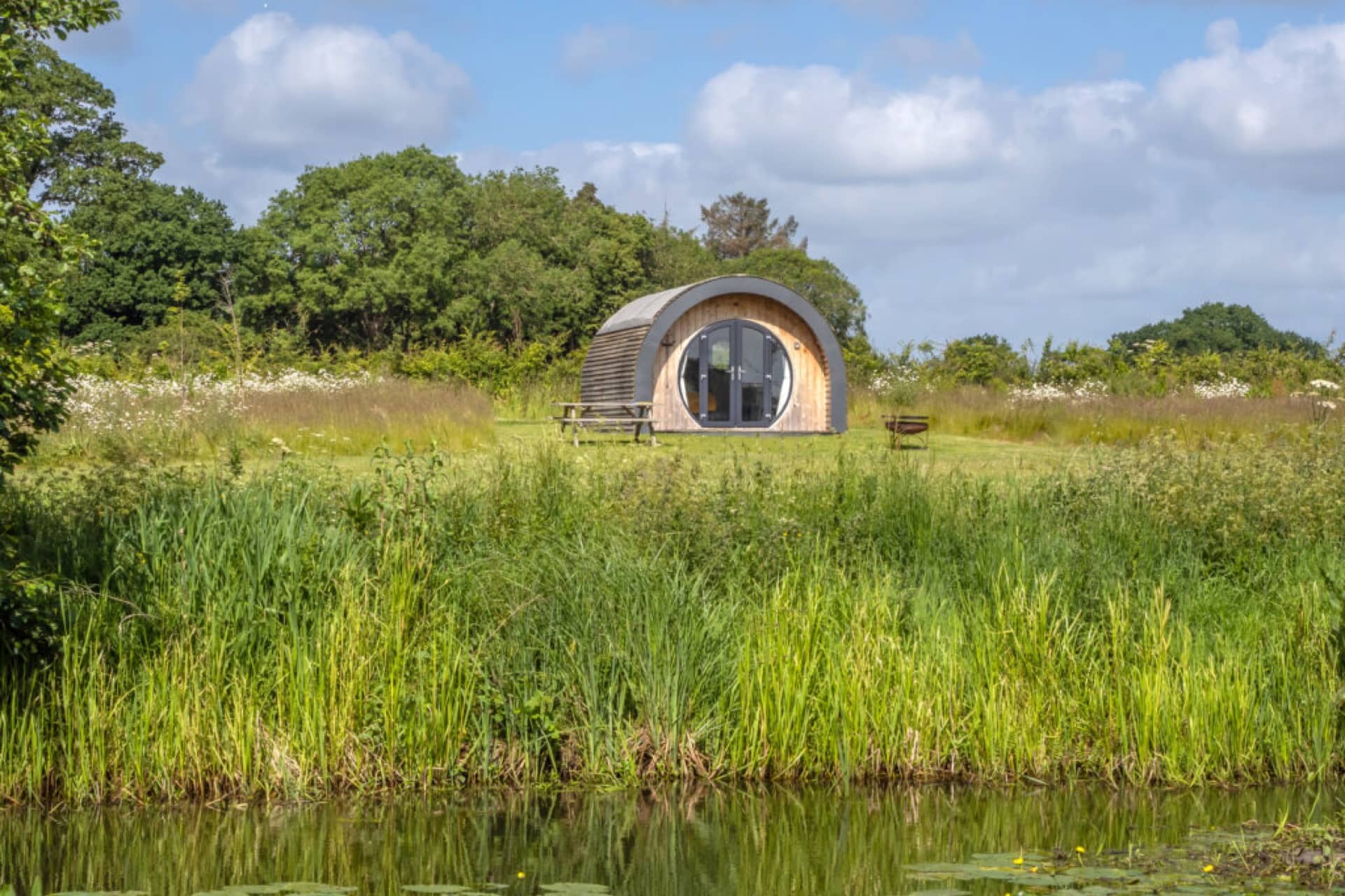 Panoramic view of glamping pod, over the canal