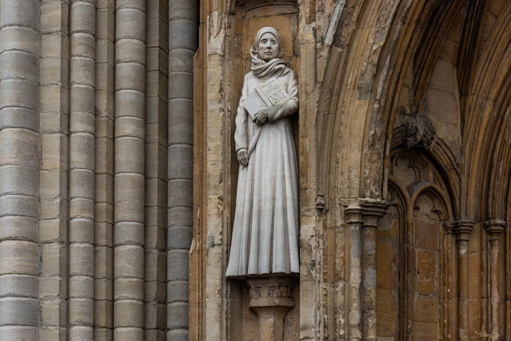 A statue of Julian of Norwich outside Norwich Cathedral